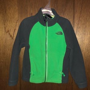 Green and gray north face fleece jacket